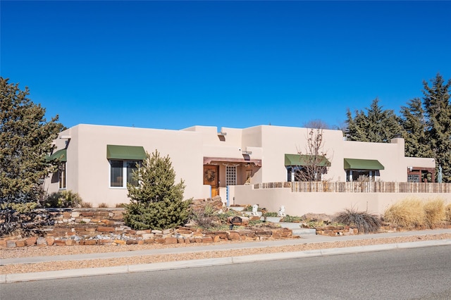 view of adobe home