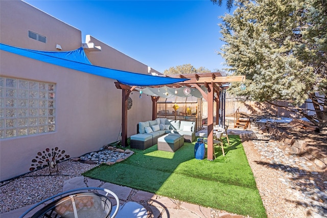 view of yard with a patio area, an outdoor living space with a fire pit, and a pergola