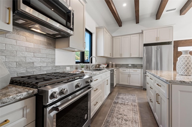 kitchen featuring stainless steel appliances, beam ceiling, white cabinets, light stone counters, and sink