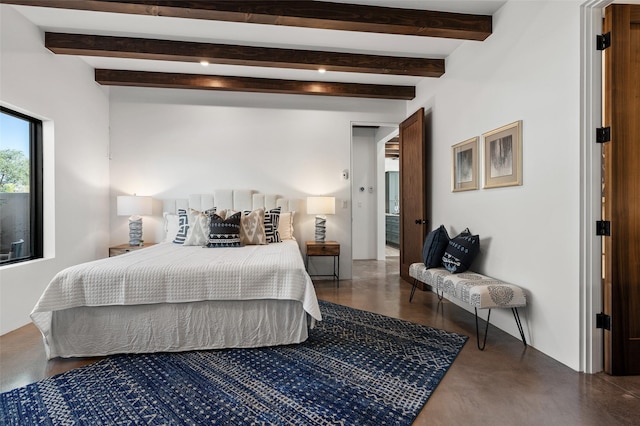 bedroom with beam ceiling