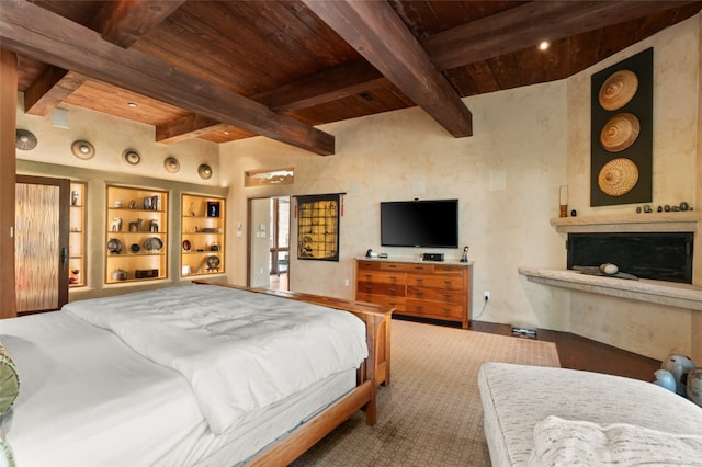 bedroom featuring wooden ceiling and beamed ceiling