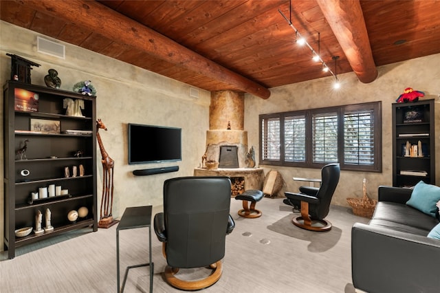 interior space with wood ceiling, beamed ceiling, and rail lighting