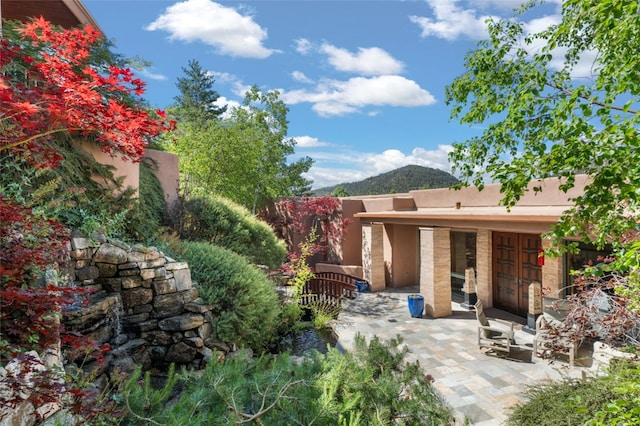 view of patio featuring a mountain view