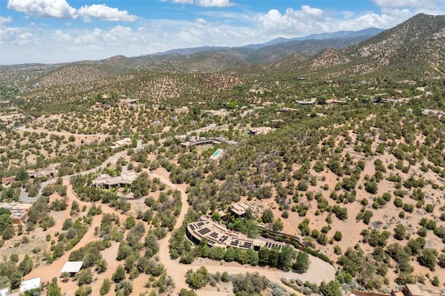 drone / aerial view featuring a mountain view