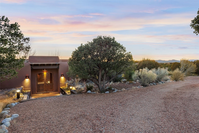 view of adobe home