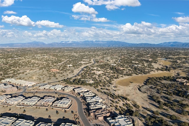 drone / aerial view featuring a mountain view