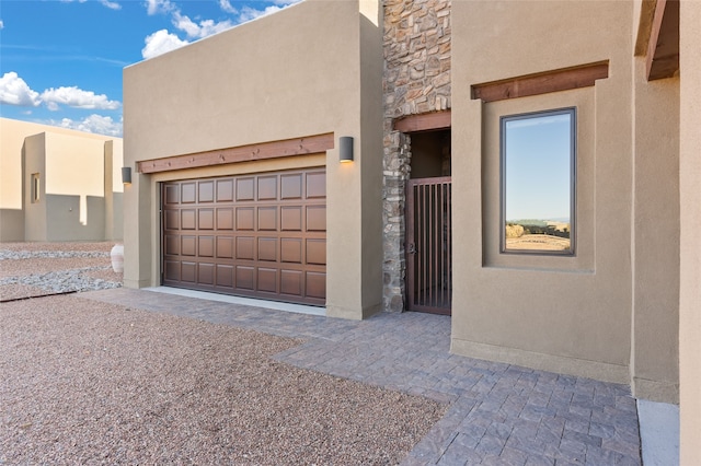 view of front of property with a garage