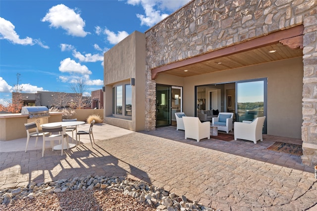 view of patio / terrace featuring outdoor lounge area and area for grilling