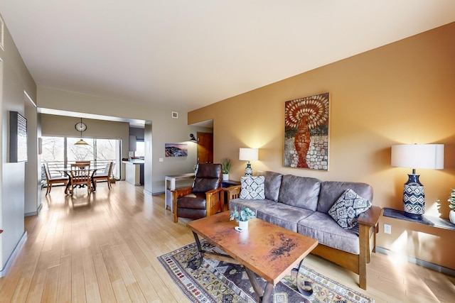 living room with light wood-type flooring