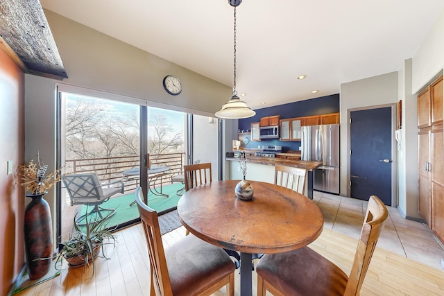 dining room with light wood-type flooring