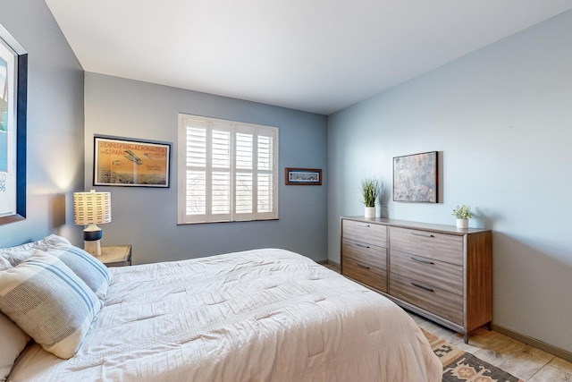 bedroom with light hardwood / wood-style flooring