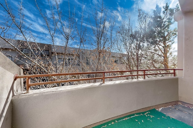 view of snow covered back of property