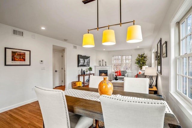 dining area featuring hardwood / wood-style flooring