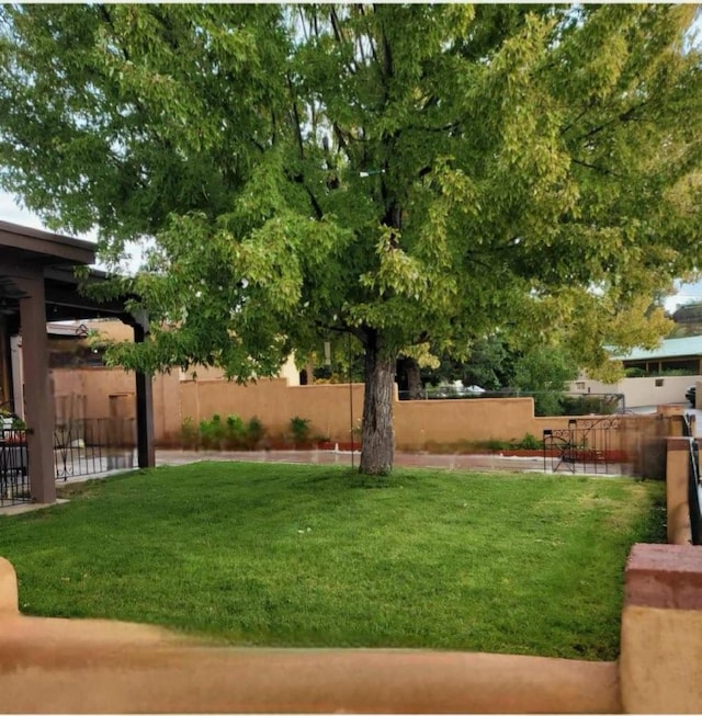 view of yard with fence