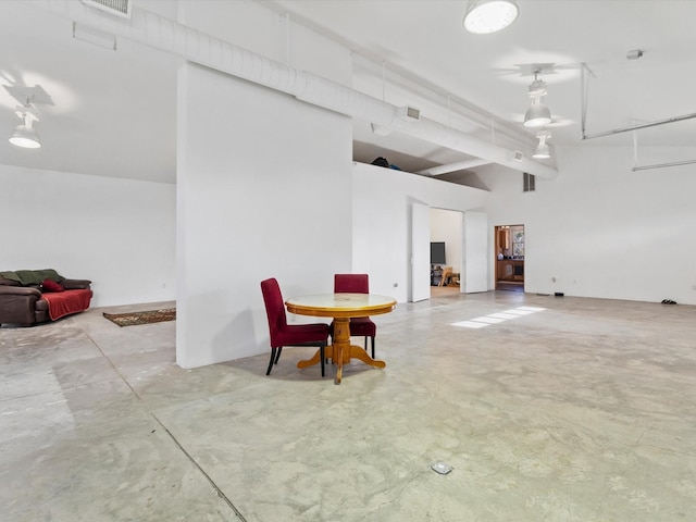 interior space featuring visible vents and concrete flooring