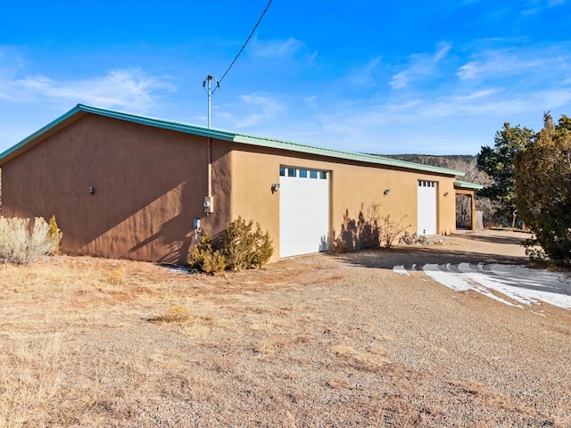 view of outdoor structure featuring a garage