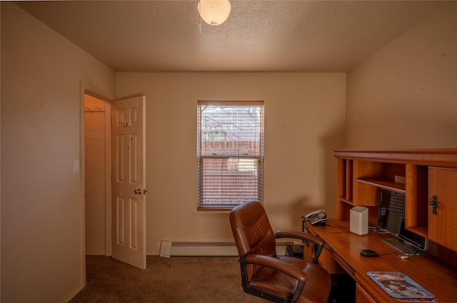 carpeted office with a textured ceiling and a baseboard radiator