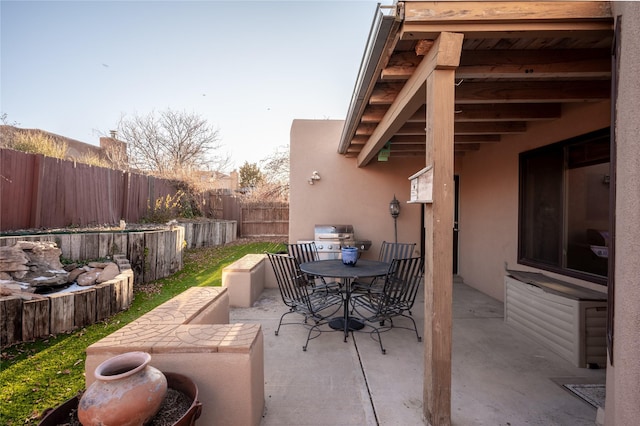 view of patio with a grill