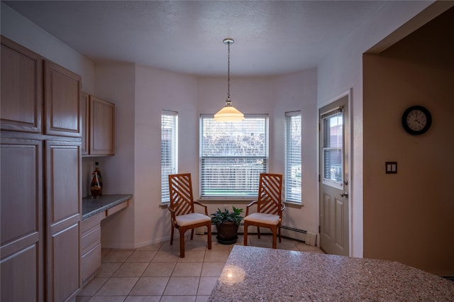 living area featuring light tile patterned floors