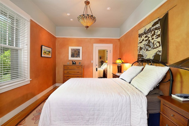 bedroom with light wood-type flooring