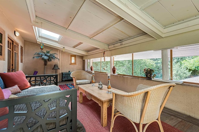 sunroom featuring a skylight