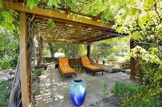 view of patio featuring a pergola