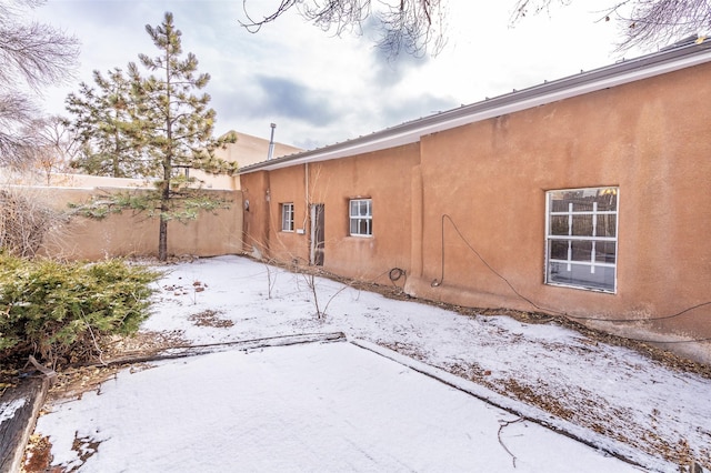 view of snow covered property