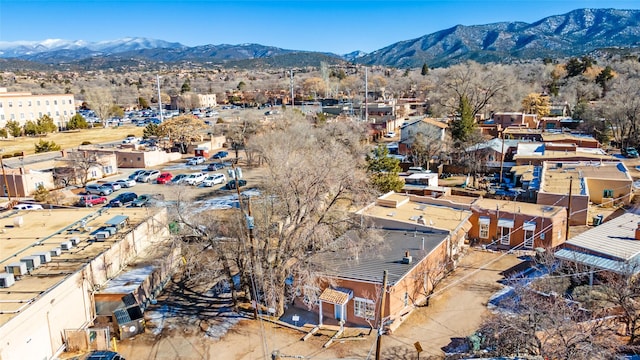 birds eye view of property featuring a mountain view