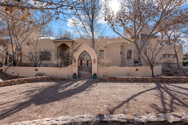 view of pueblo revival-style home