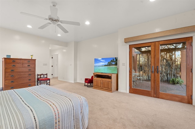 carpeted bedroom with ceiling fan, french doors, and access to outside