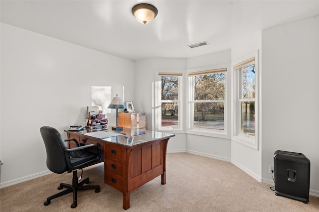 view of carpeted office space