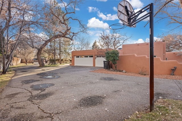 exterior space with a garage