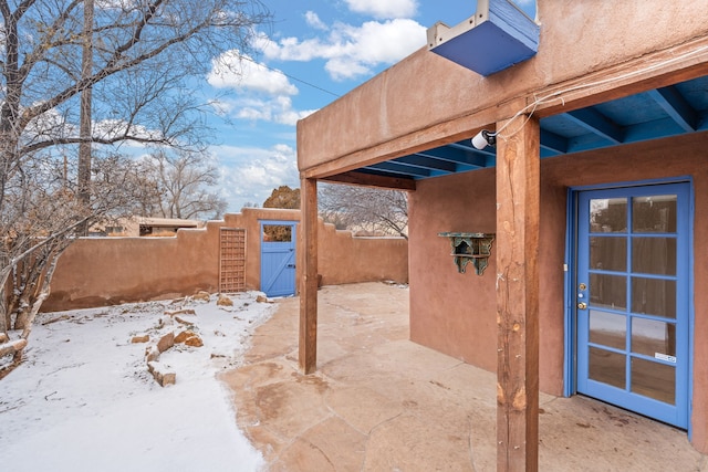 view of snow covered patio