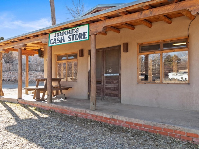 420 Camino Don Miguel, Santa Fe, NM 87505 - property entrance with stucco siding and fence