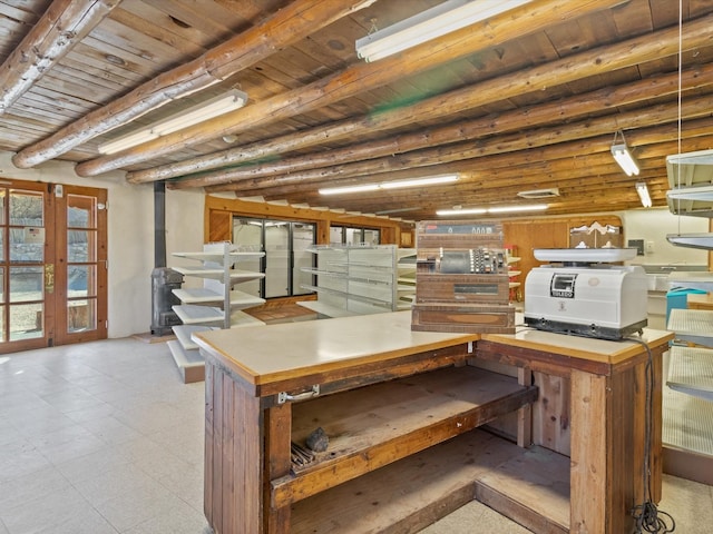 basement featuring french doors, wooden ceiling, and tile patterned floors