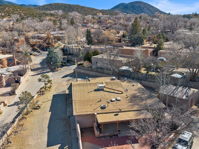 birds eye view of property featuring a mountain view