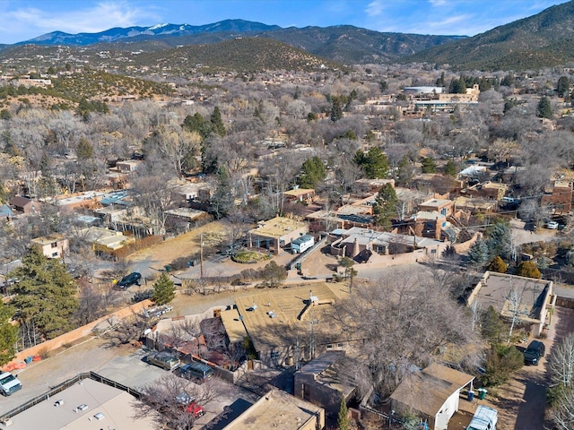 birds eye view of property with a mountain view