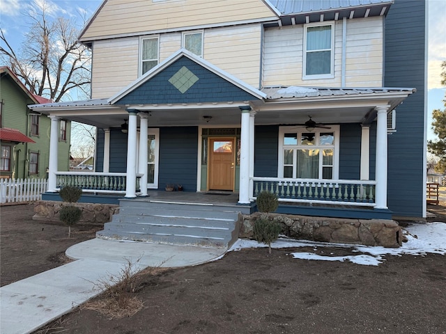 view of front of property with covered porch and ceiling fan