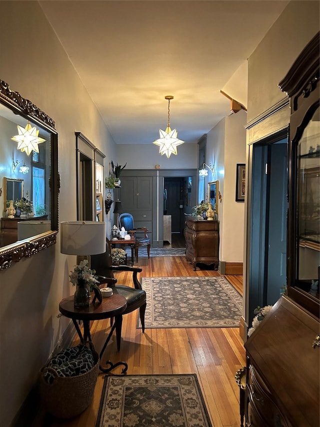 corridor featuring hardwood / wood-style floors