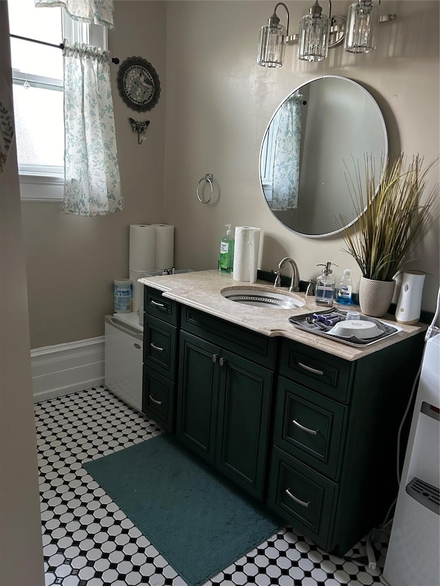 bathroom featuring tile patterned floors and vanity