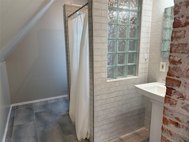 bathroom with curtained shower