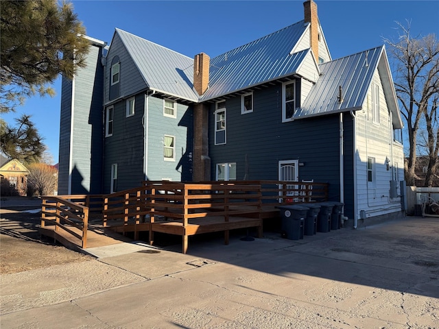 view of front of home with a wooden deck