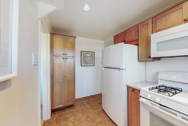 kitchen featuring white appliances