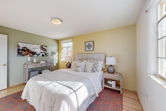 bedroom with light hardwood / wood-style flooring