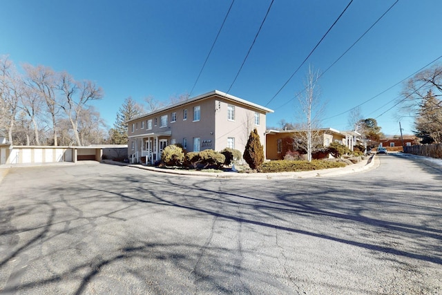 view of property exterior featuring a garage