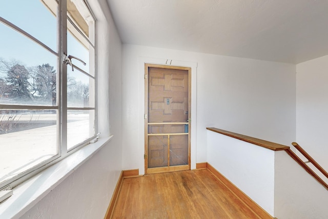 doorway to outside with hardwood / wood-style flooring