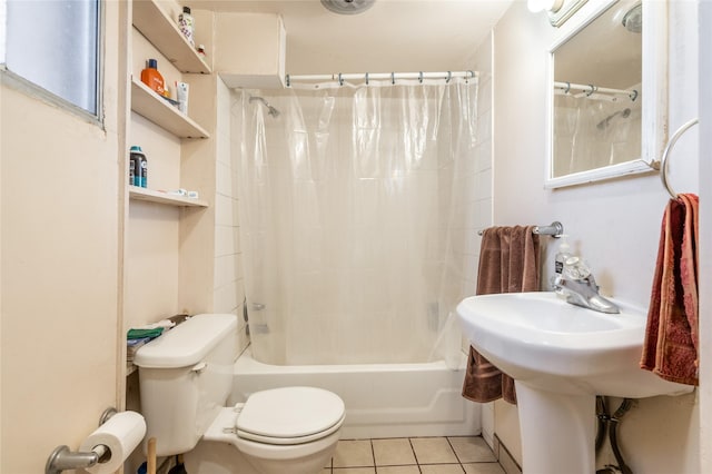 bathroom featuring toilet, shower / bath combination with curtain, and tile patterned floors