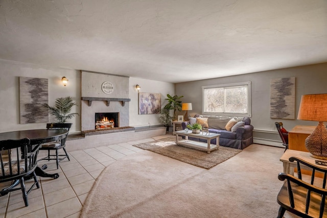 tiled living room featuring a brick fireplace and baseboard heating