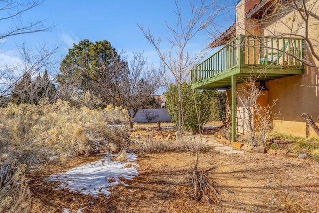 view of yard featuring a wooden deck