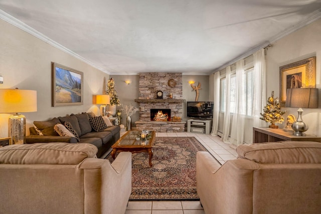 living room featuring crown molding, a stone fireplace, and light tile patterned flooring